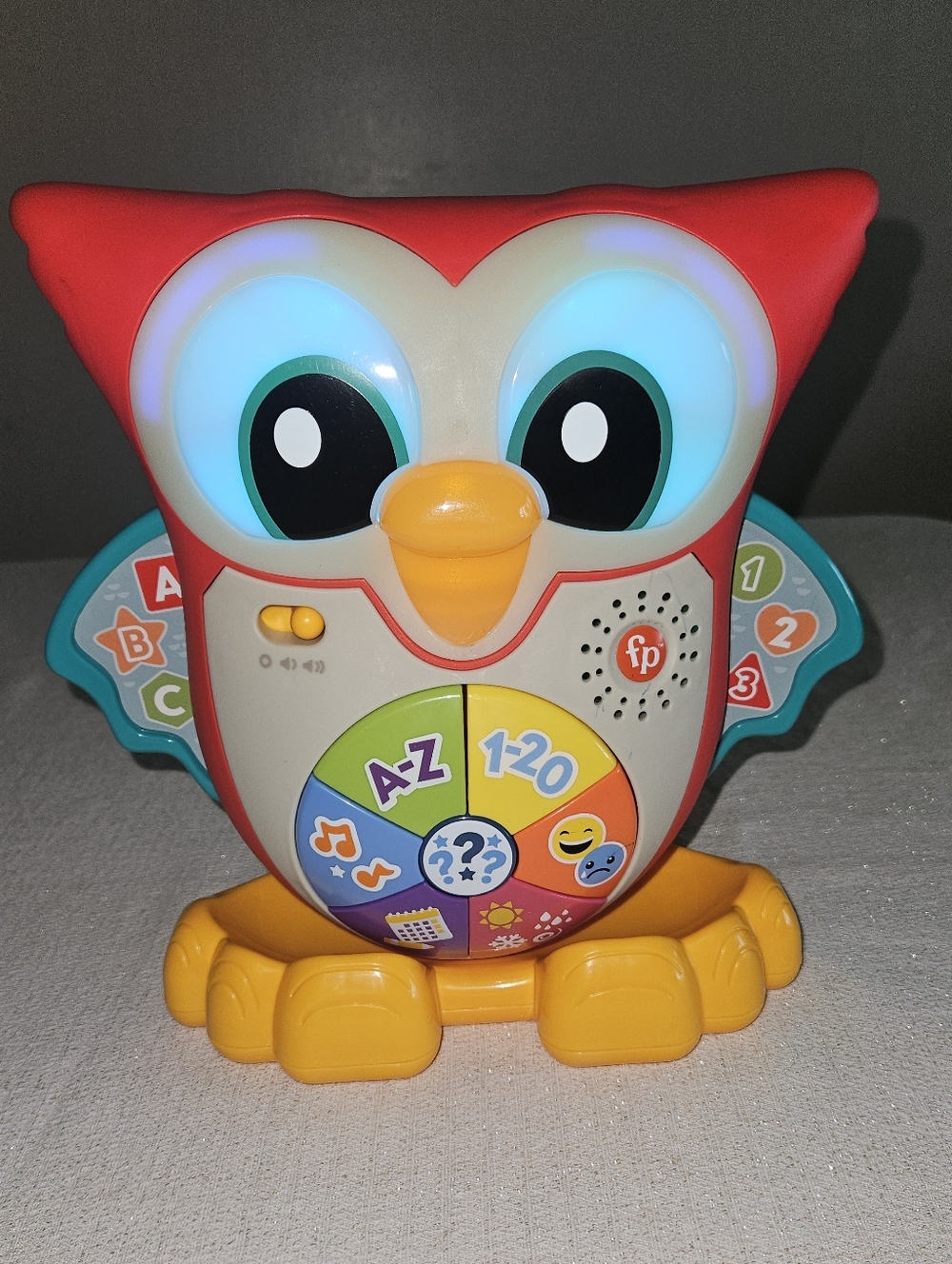 Fisher-Price Red and Yellow Light-Up Owl Learning Toy with Teal Wing Accents